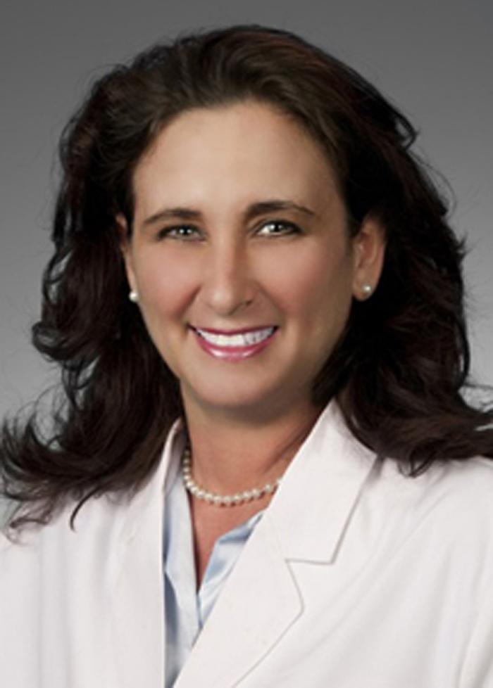Dr. Michelle Becker, board-certified family medicine physician and owner of Diamond Cove Concierge Medicine in Naples, FL